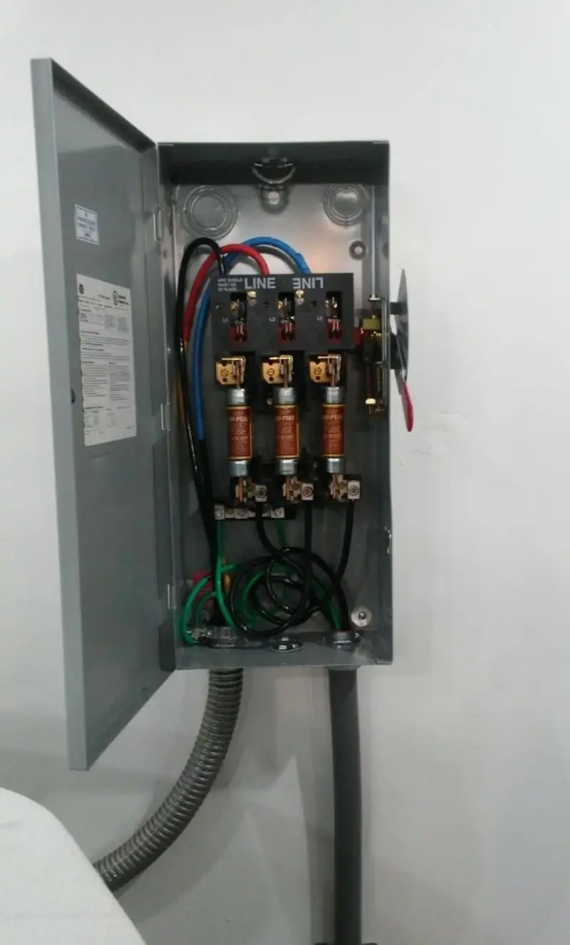 Three-phase disconnect switch installed for Smoke Detector Installation in Cape Canaveral