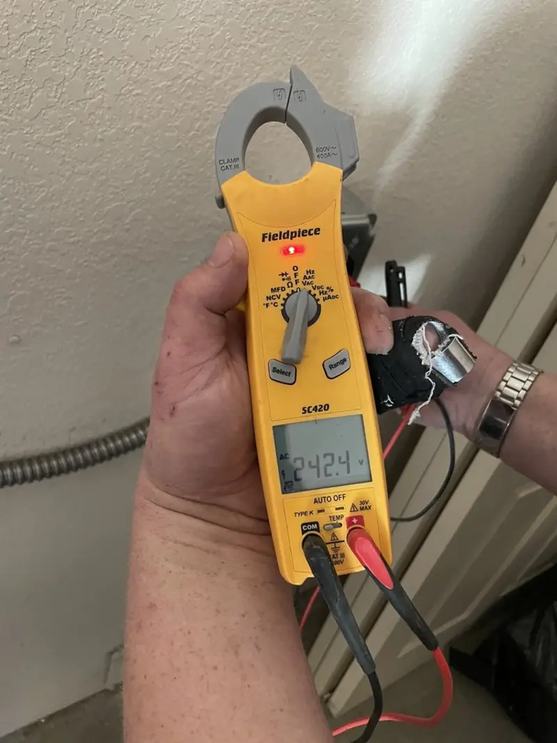 Voltage testing with clamp meter during Generator Installation in Cape Canaveral